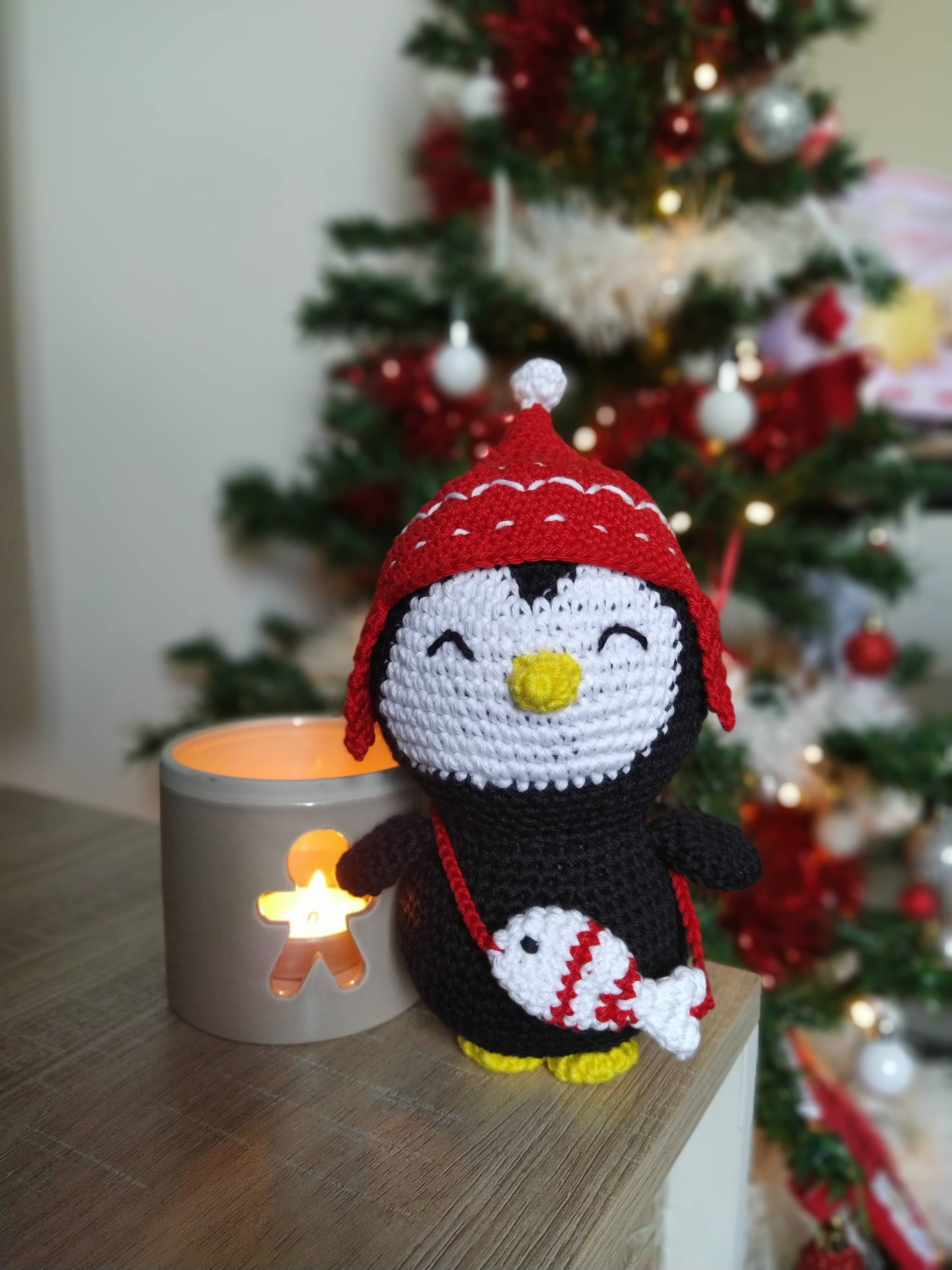 Pingouin avec sacoche poisson